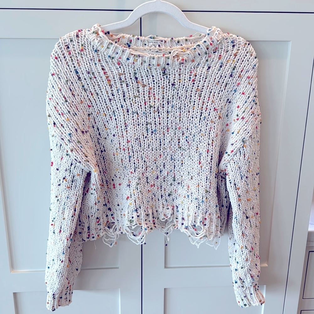 Distressed cropped sweater